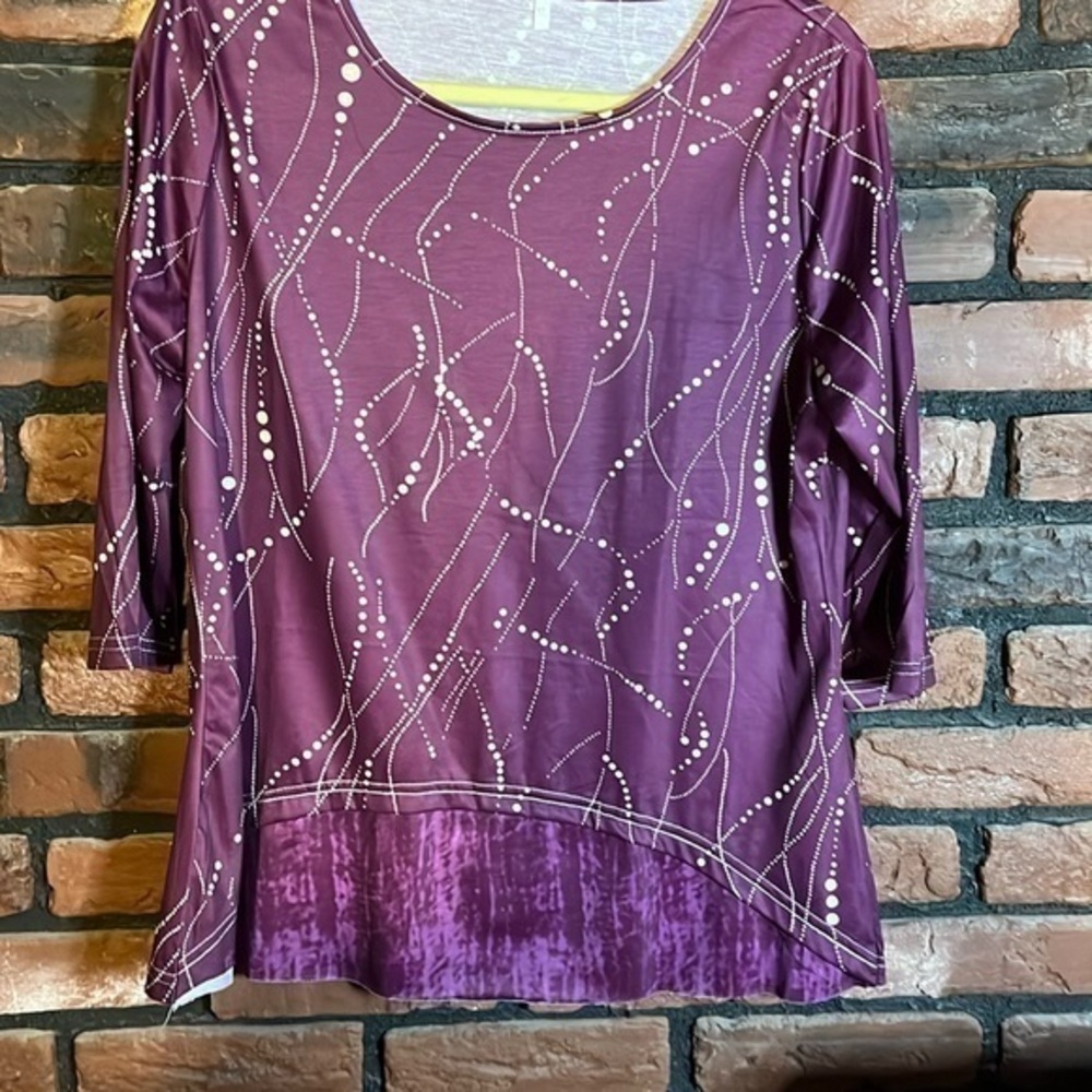 NWOT plum colored top!